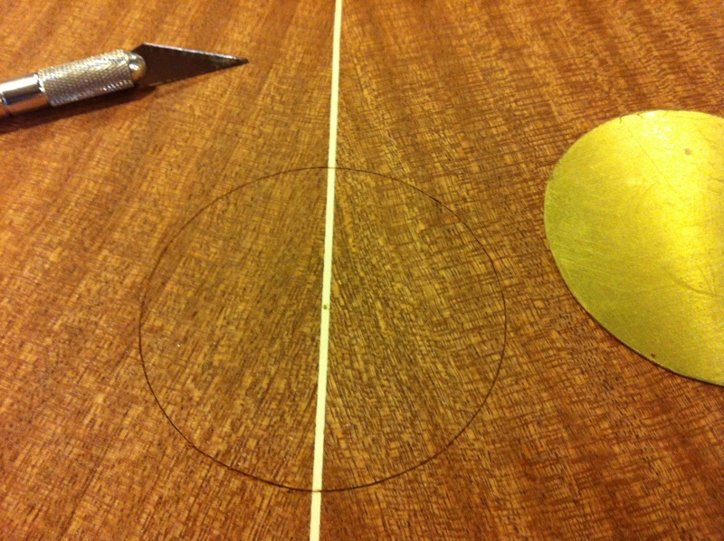 Inlaying a brass disc