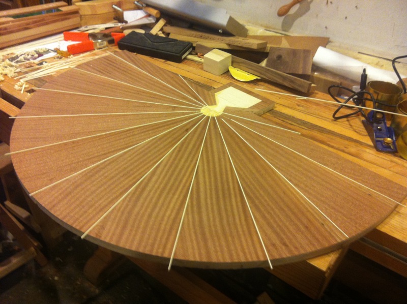 Table top with veneer and holly inlay