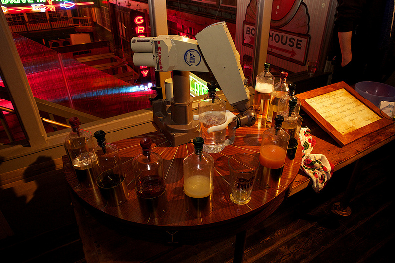 Robot bartender, mixing drinks